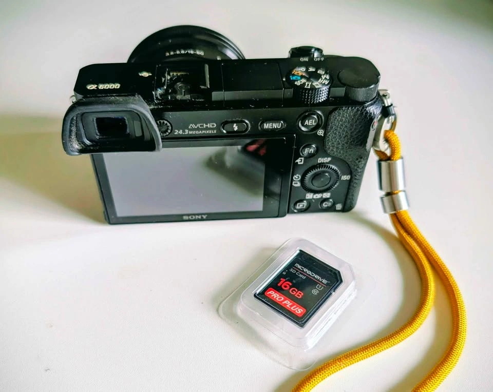 Sony a6000 Camera Bundle: 2 Lenses, Charger, Filters & SD - photo 2