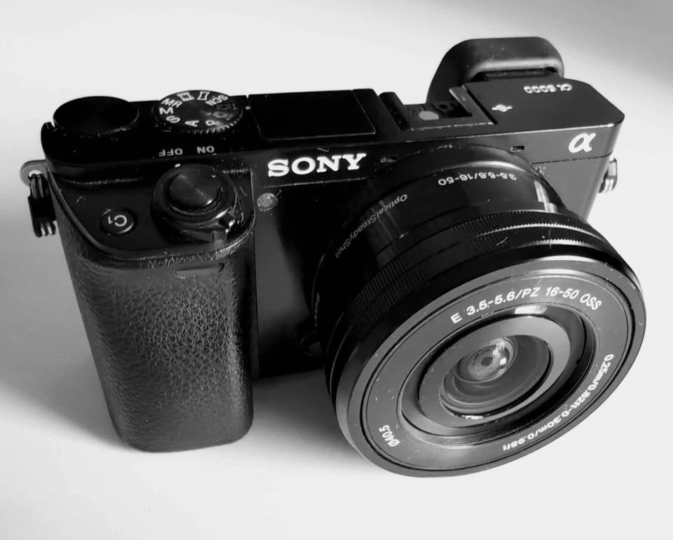 Sony a6000 Camera Bundle: 2 Lenses, Charger, Filters & SD - photo 3