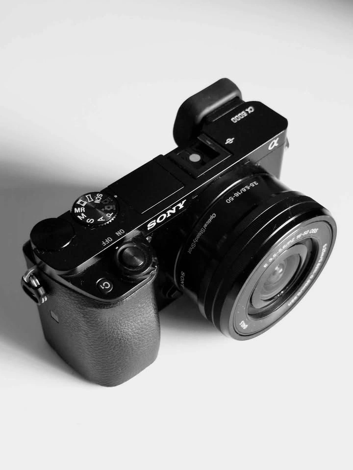 Sony a6000 Camera Bundle: 2 Lenses, Charger, Filters & SD - photo 4