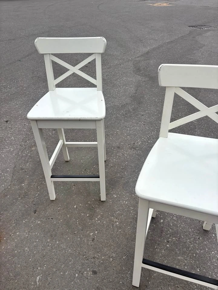 White wooden high chairs