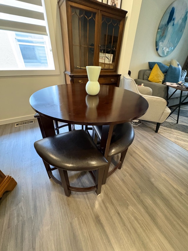 Space-Saving Round Dining Table & Nesting Stools