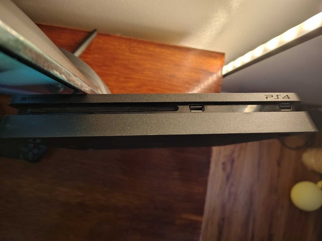 Sony PlayStation 4 Slim - photo 5