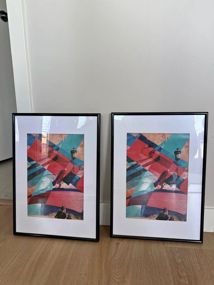 Pair of black frames with mat