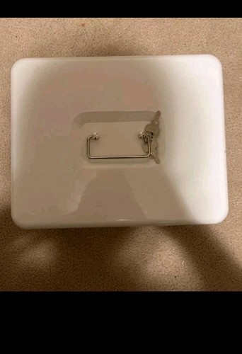 White metal cash box with keys