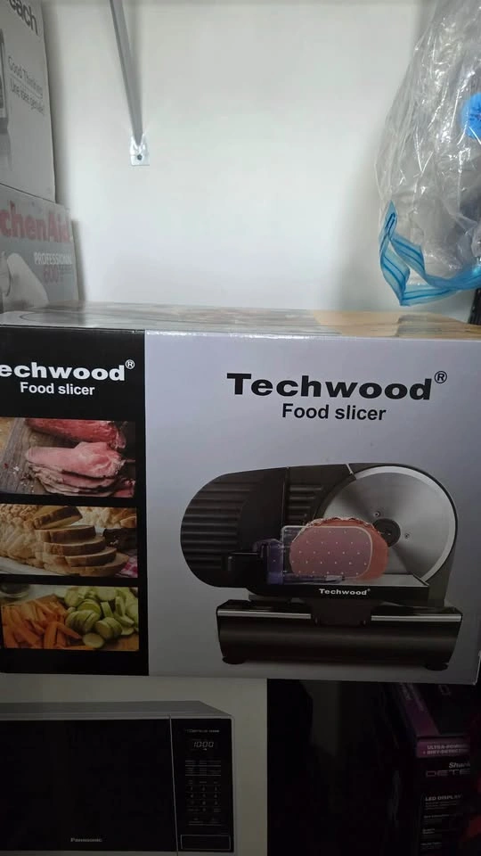 Moving sale (food slicer, fryer) - photo 2