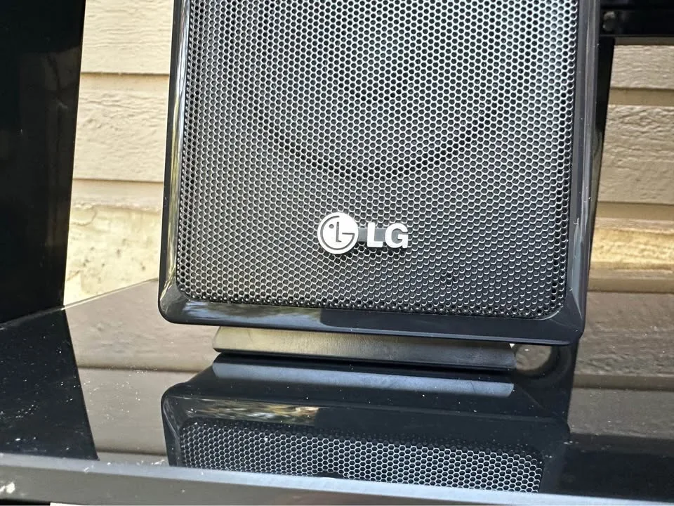 LG 60” TV and LG Surround Sound & Stand image indicator(3)