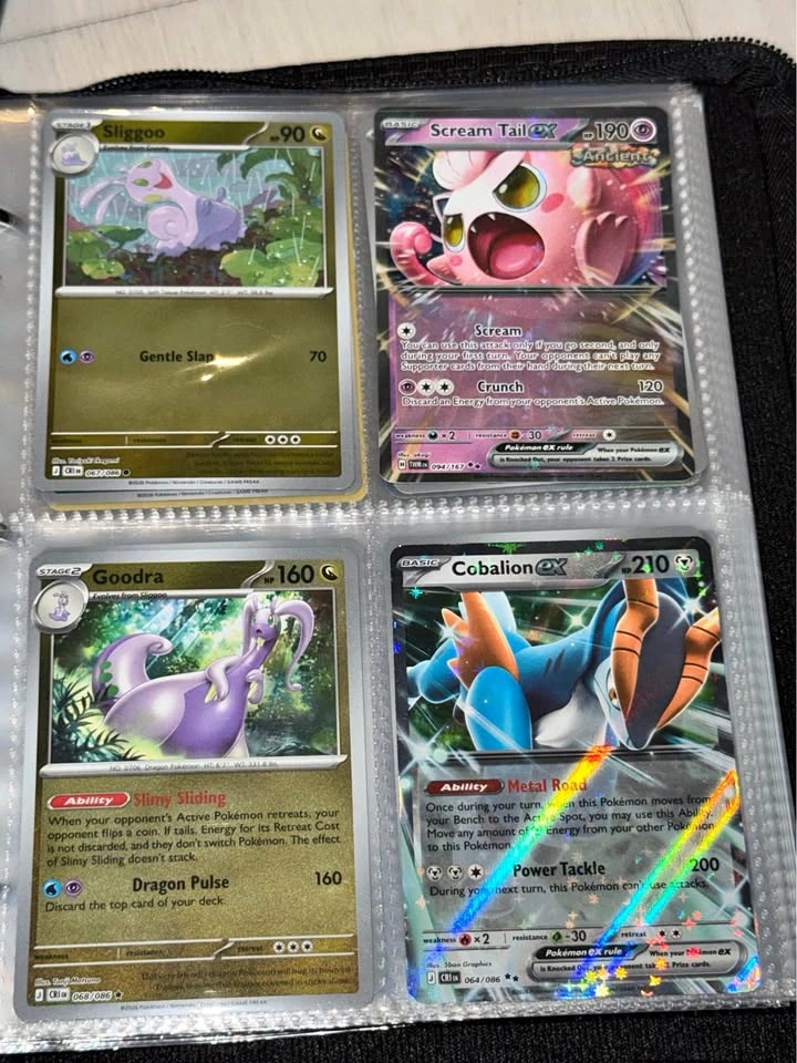 Filled Pokémon card binder