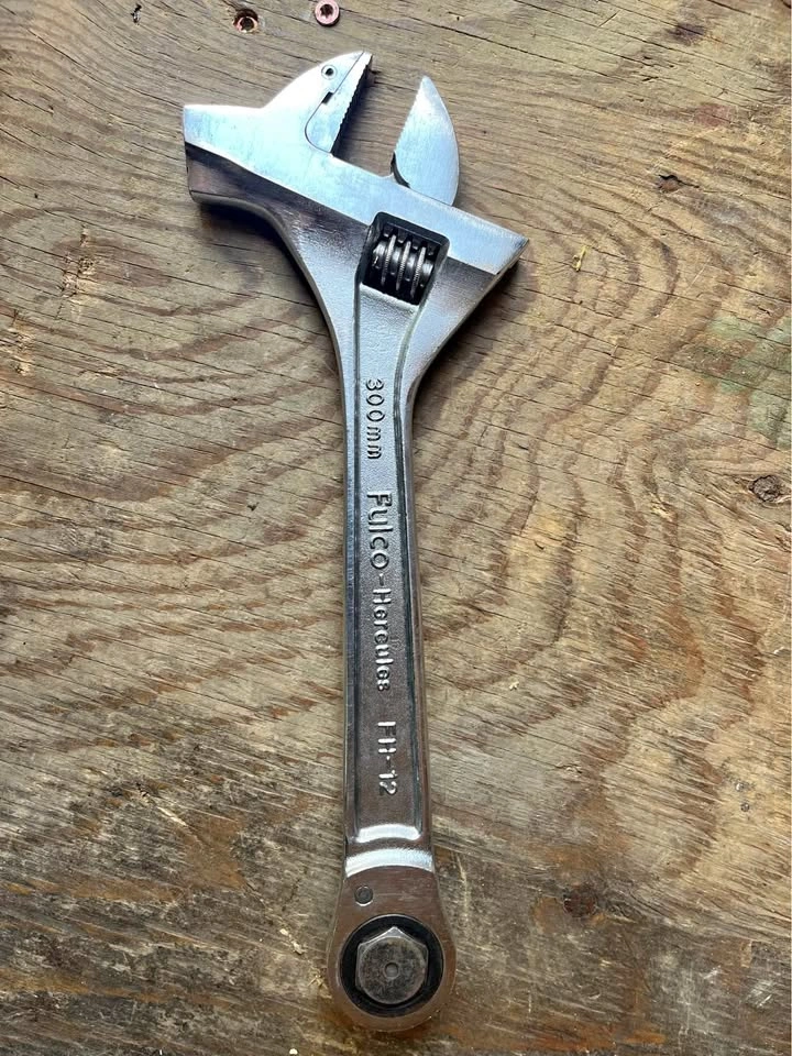 All in one adjustable wrench