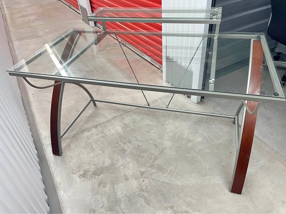 Desk with glass top and shelf