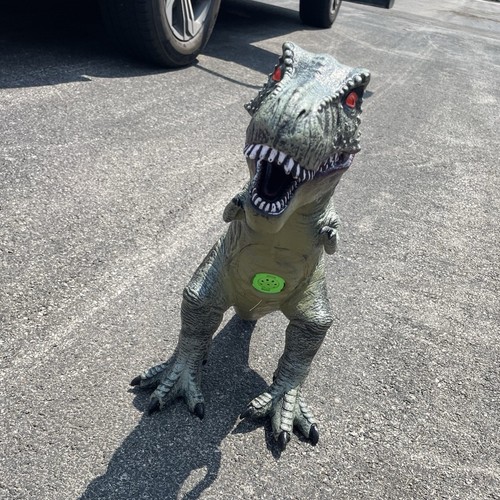 Kids T-Rex Dinosaur soft play toy. Button on chest for sound
