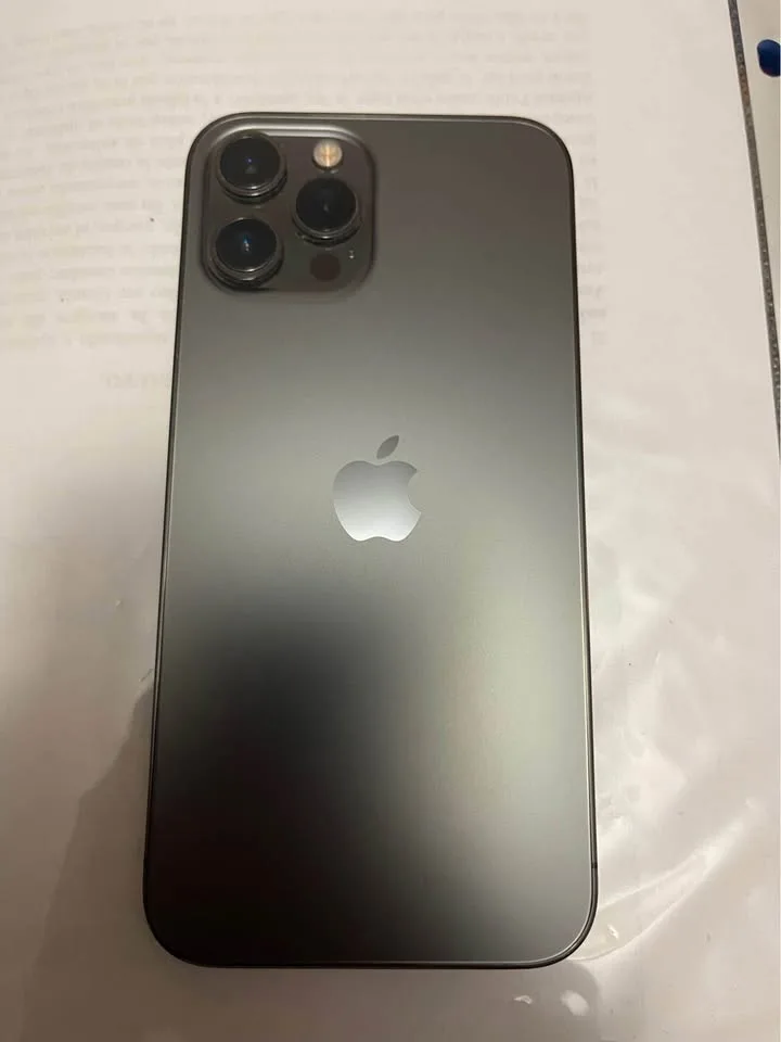 Unlocked IPhone 12 Pro Max 128 GB w/ Case LNIB image indicator(4)