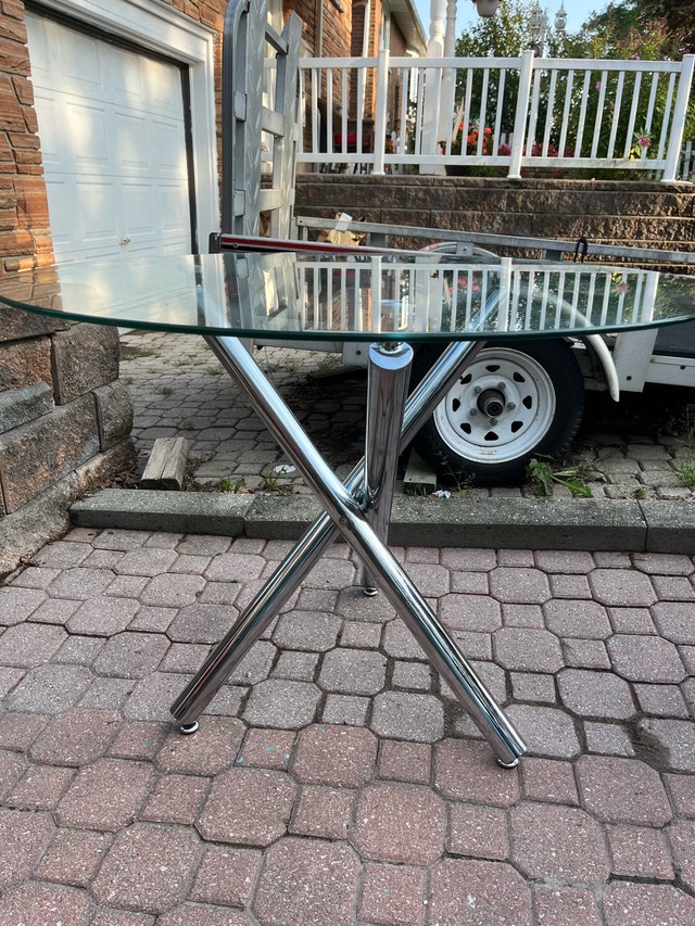 Glass dining table with chairs