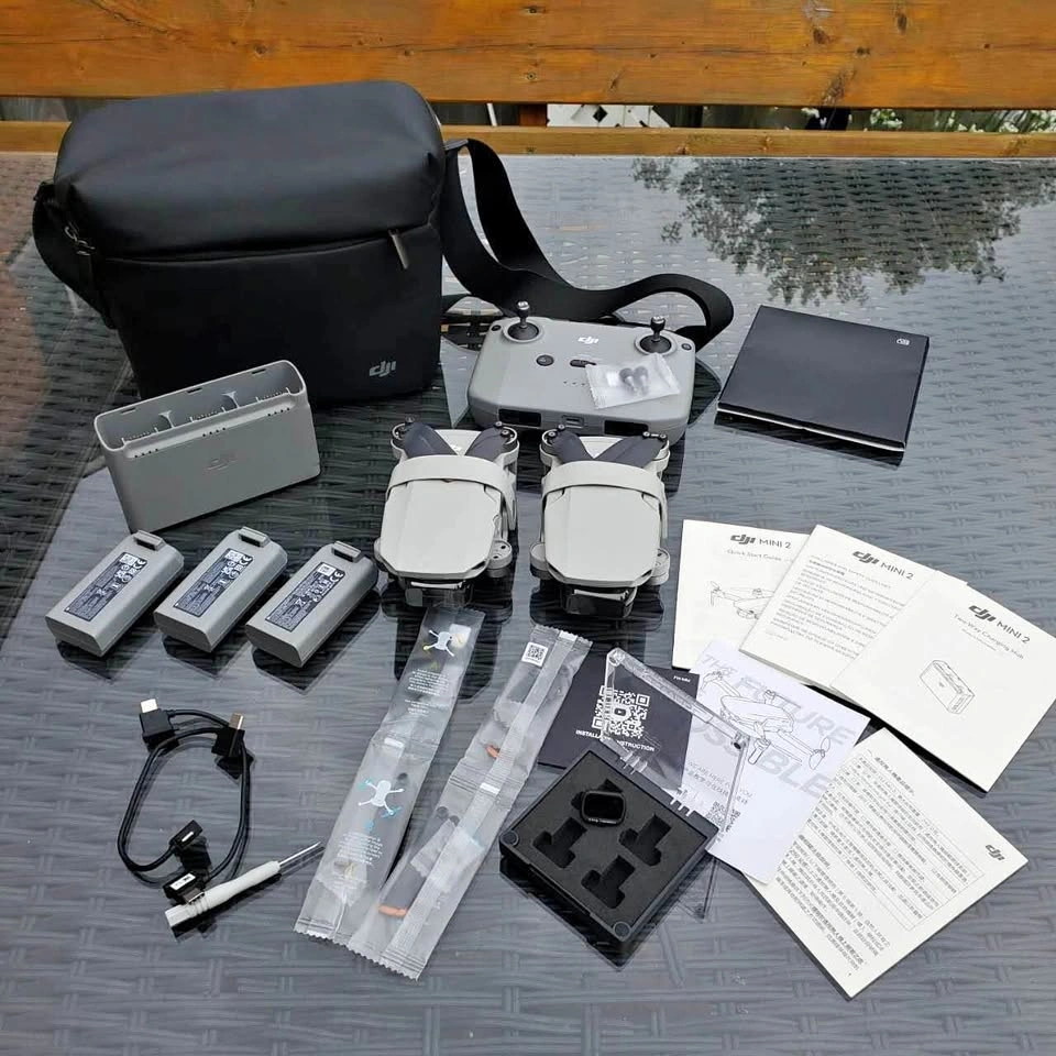 2x DJI Mini 2 Drones with Remote, Batteries, Hub, Bag, Filter
