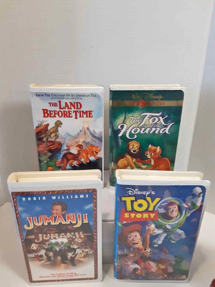 Lot of 4 Classic VHS Movies: Toy Story, Jumanji, Land Before Tim