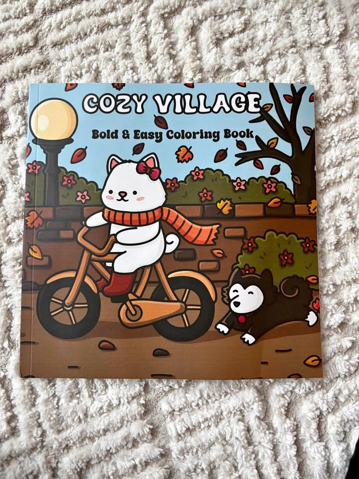 Cozy village colouring book