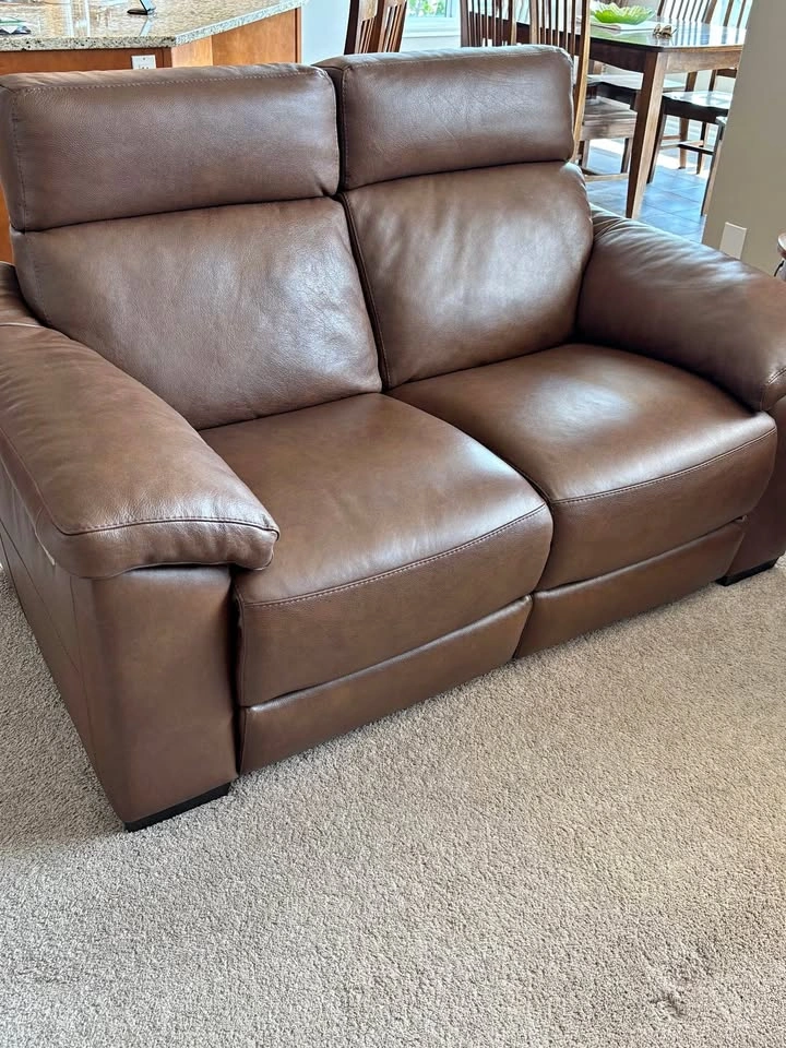 Power Reclining Leather Natuzzi Couch and Loveseat