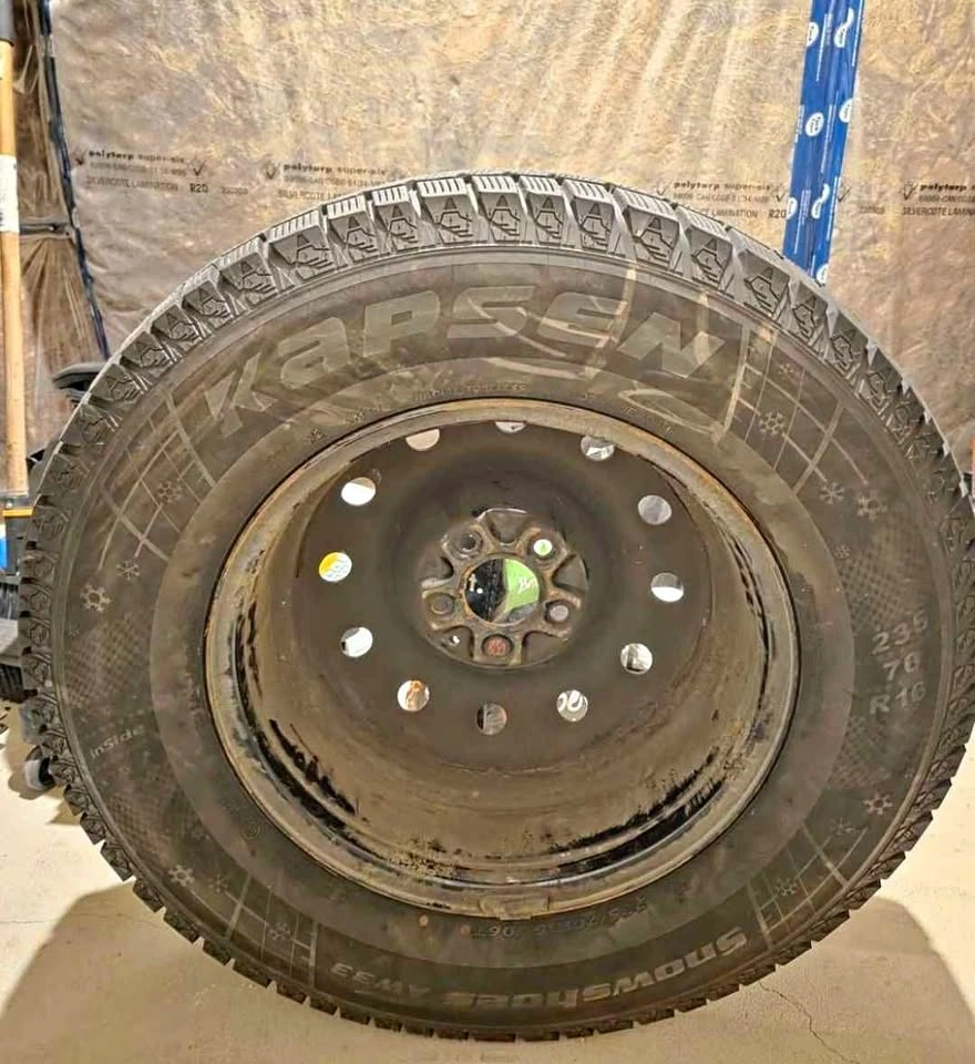 Winter Tires 235/70R16 on Black Steel Rims