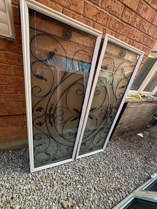 Pair of Decorative Wrought-Iron Glass Window Inserts
