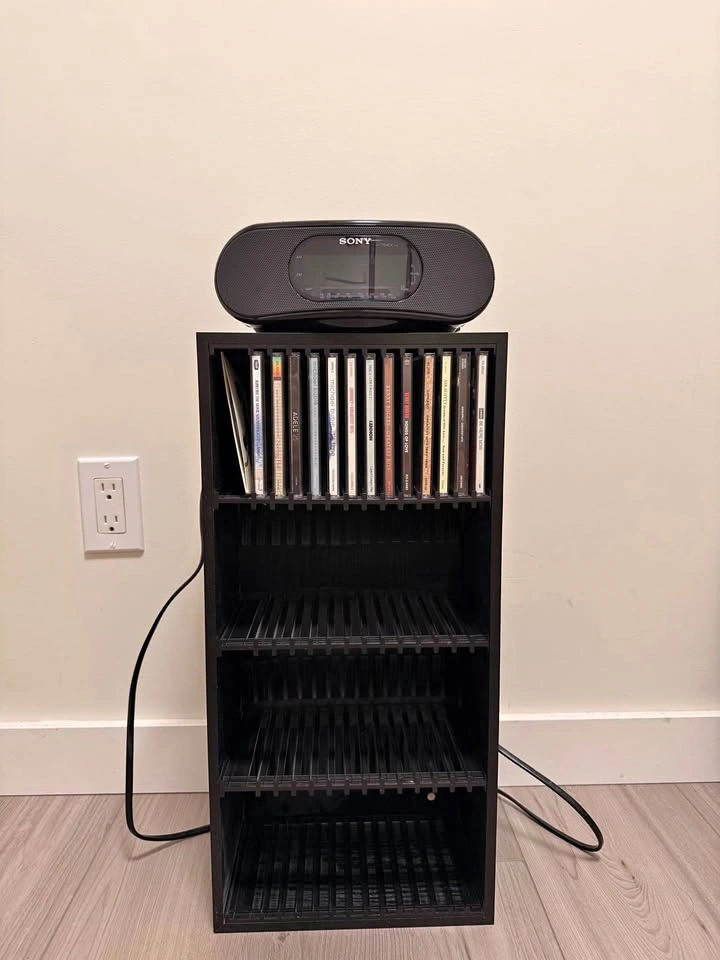 Vintage Sony CD Clock Radio & 4-Tier Storage Tower with 13 CDs