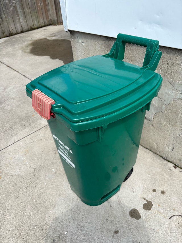Green bin with wheels