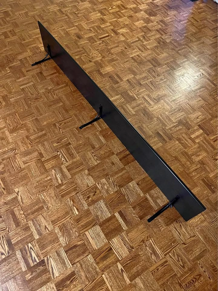Black shelf with brackets