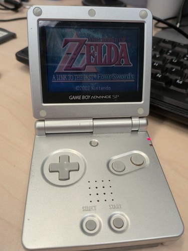 Nintendo Game Boy Advance SP Handheld System - Silver AGS-001