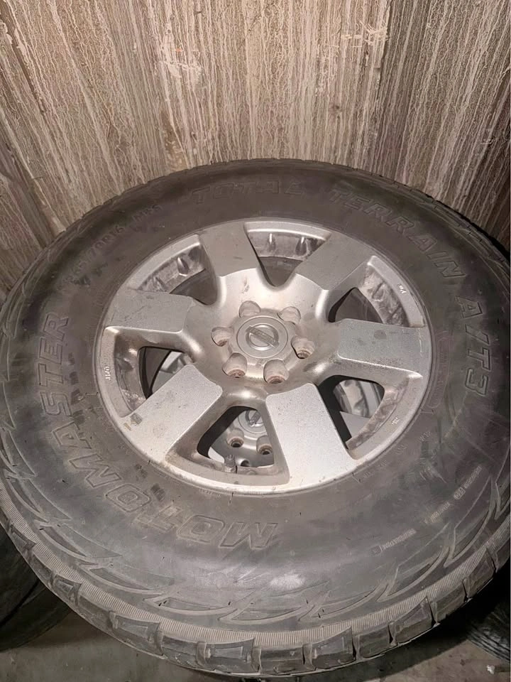 MotoMaster Total Terrain A/T3 265/70R16 Tires on Nissan Wheels