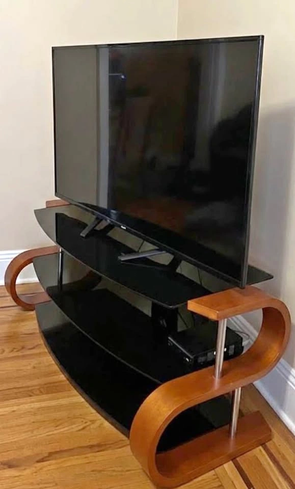 55” modern curvy tv stand - like new - bentwood tempered glass