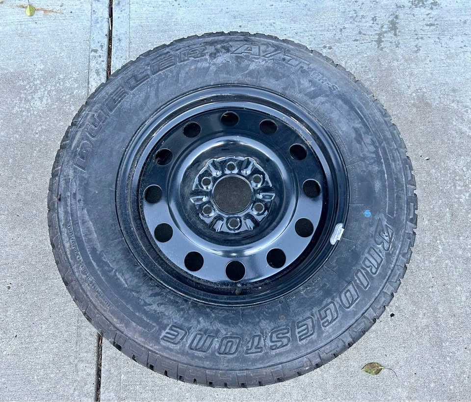 255/70R18 Bridgestone Tire on new Rim - Like new