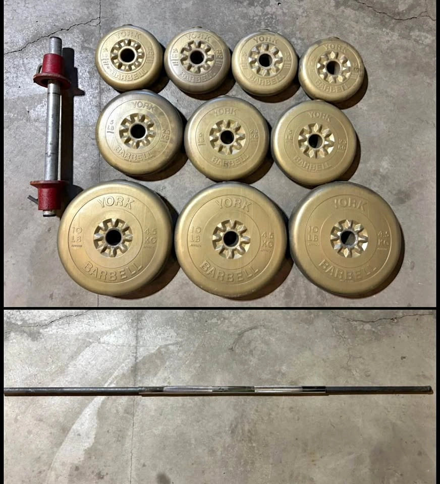 55lbs of Weights & 6’ Weighted Bar