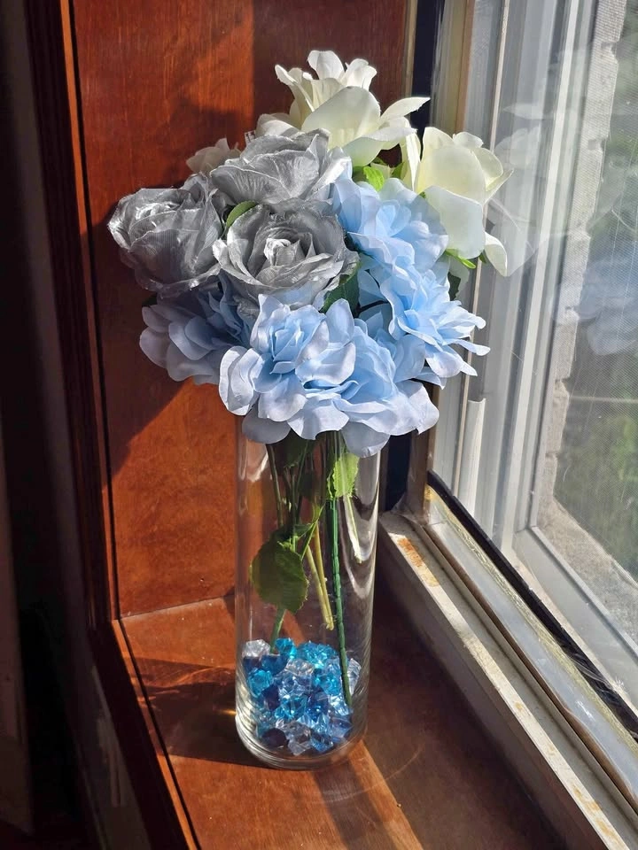 Decorative Flower Arrangement in Glass Vase