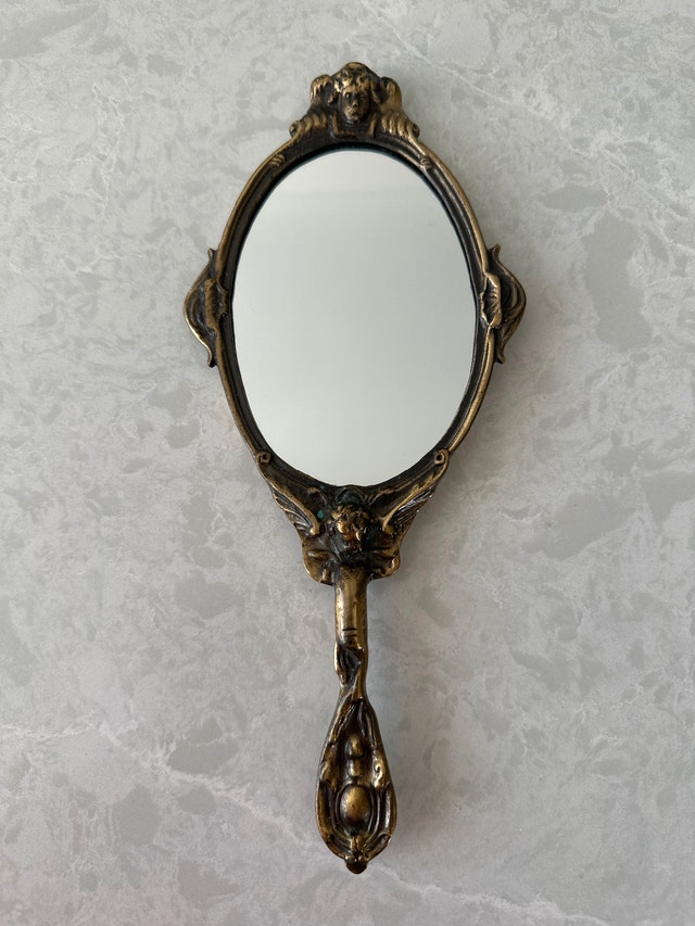 Vintage Baroque or Art Nouveau style brass hand mirror