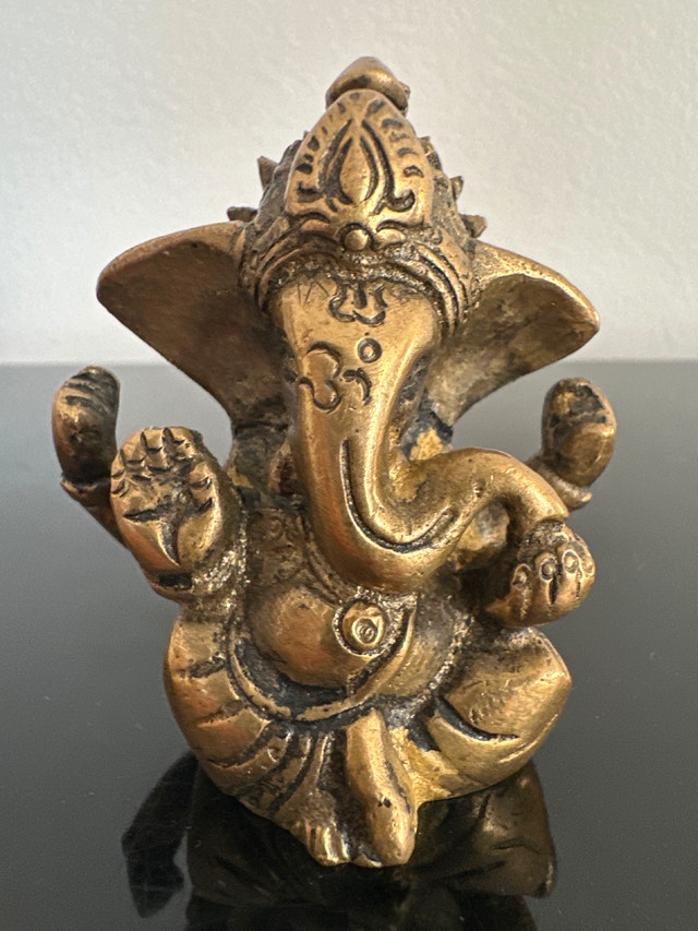 Vintage brass statue of Lord Ganesha. 2.5 in. tall.