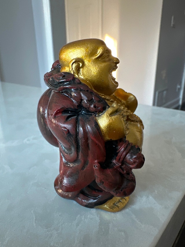 Laughing Buddha statue, also known as Budai or Hotei. - photo 4