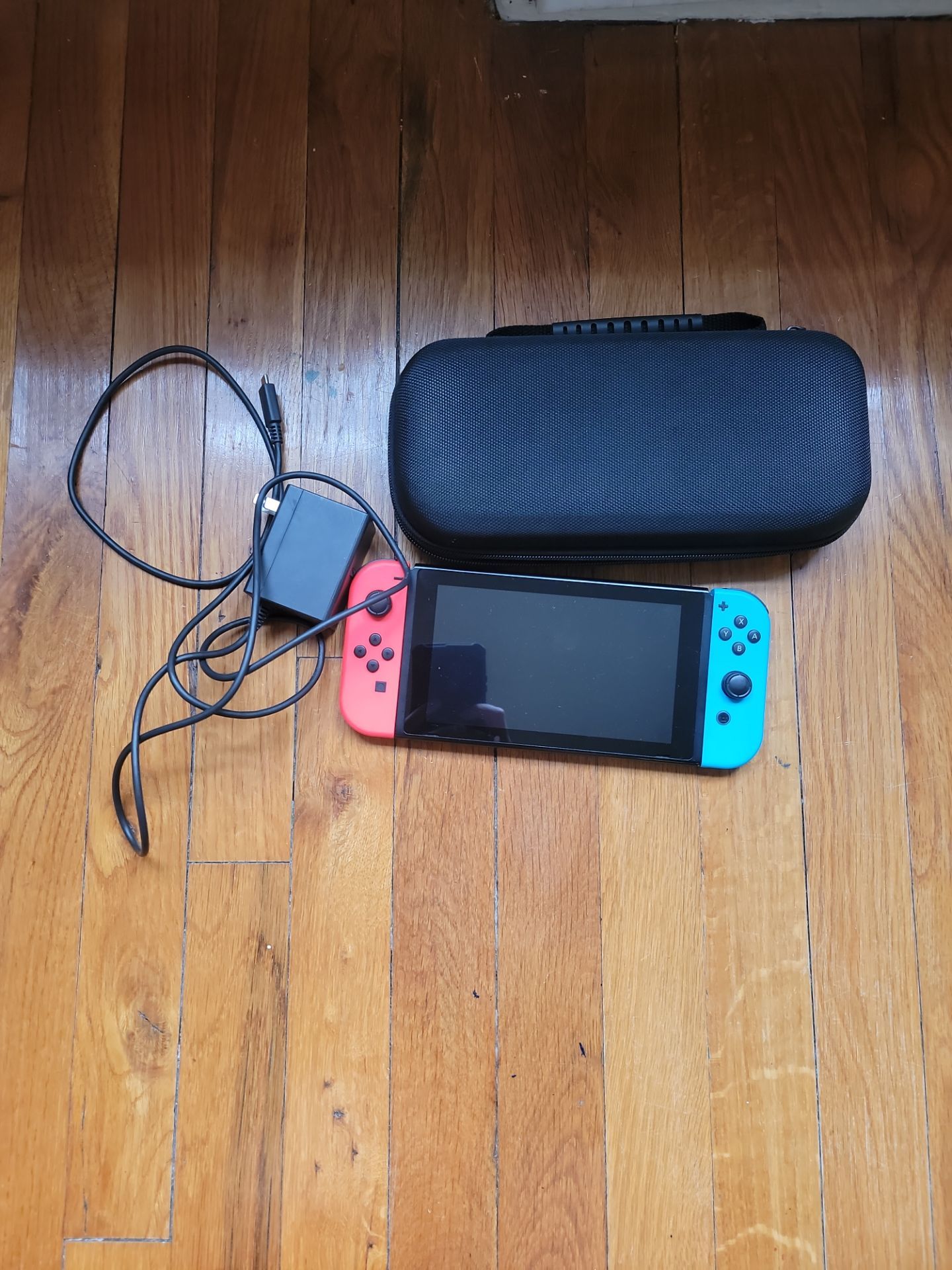 Nintendo Switch with New Case and Charger