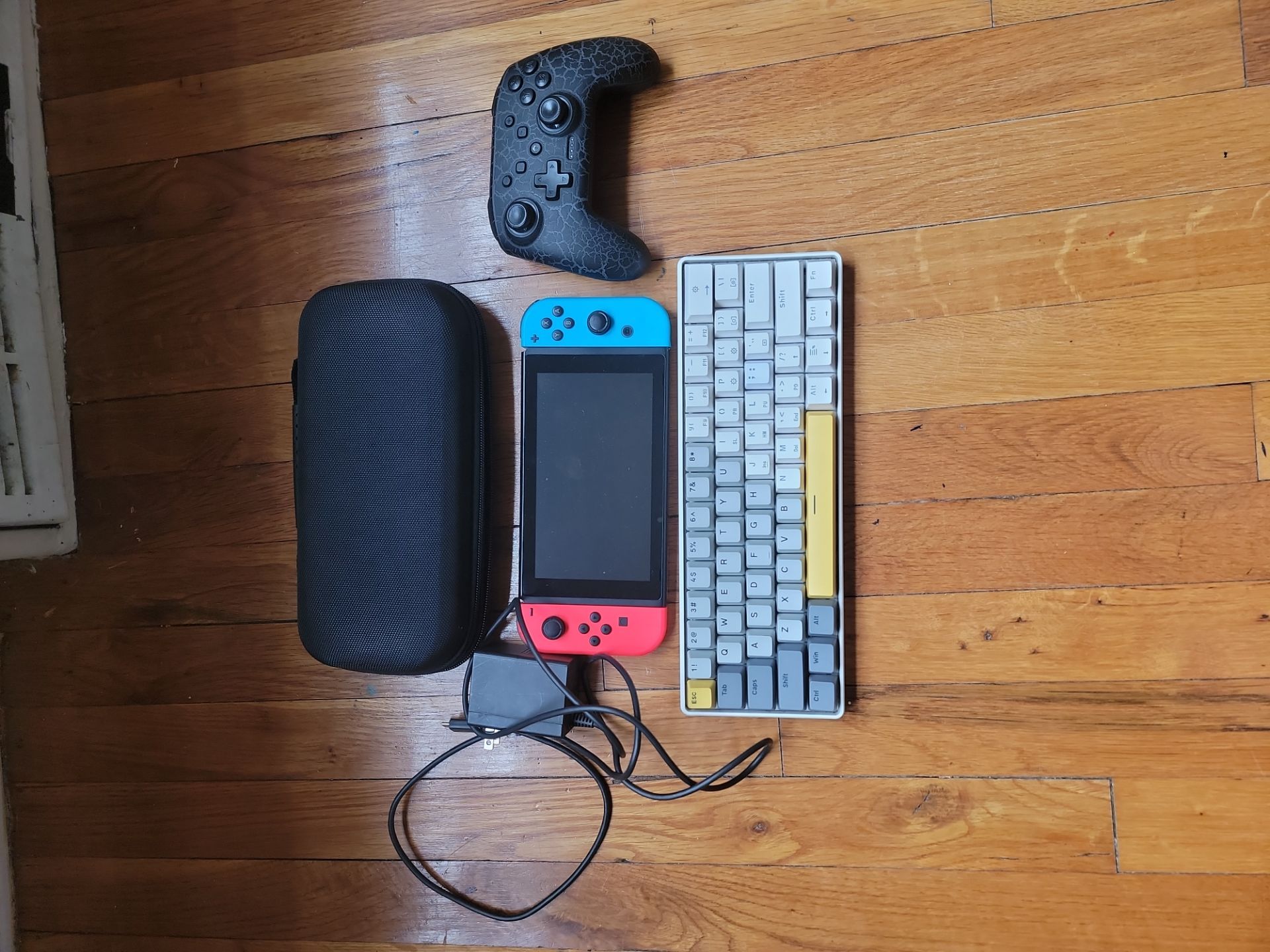 Nintendo Switch with Case, Controller, Keyboard, and Charger