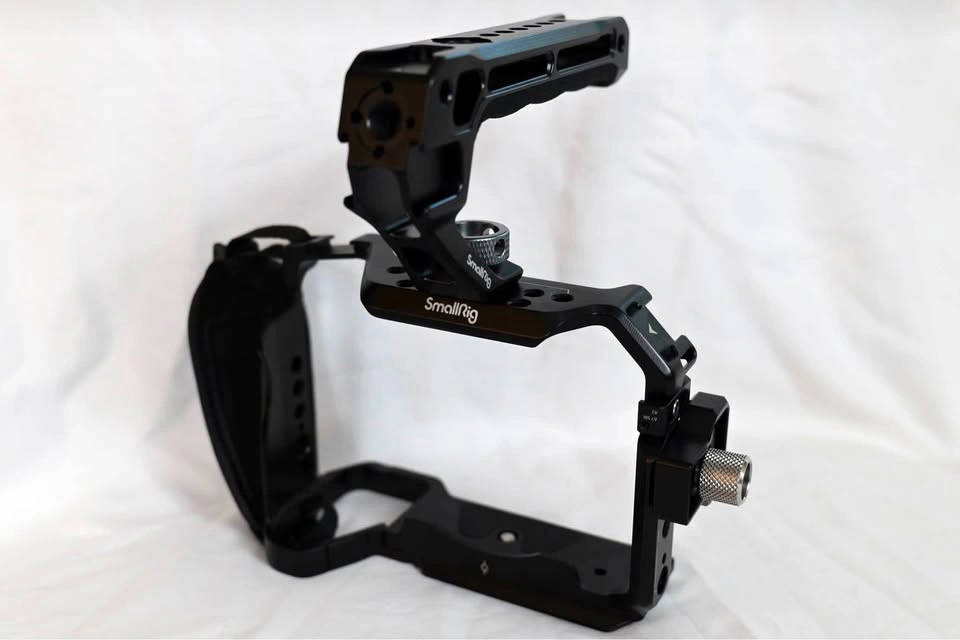 Sony A7iv Smallrig cage with handle, wrist strap and cable clamp