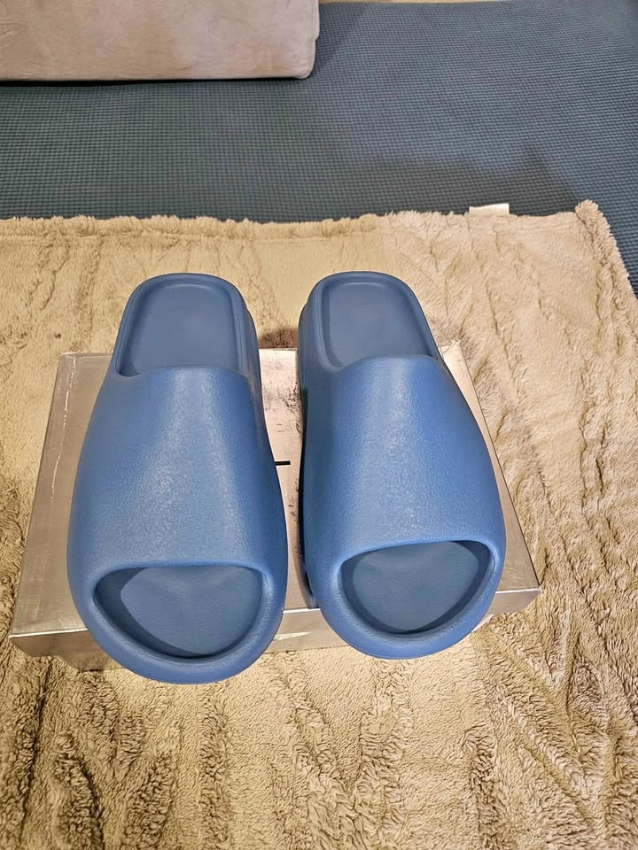 Brand New Yeezy Slides in Azure Blue, Size 9 men / 10 Women