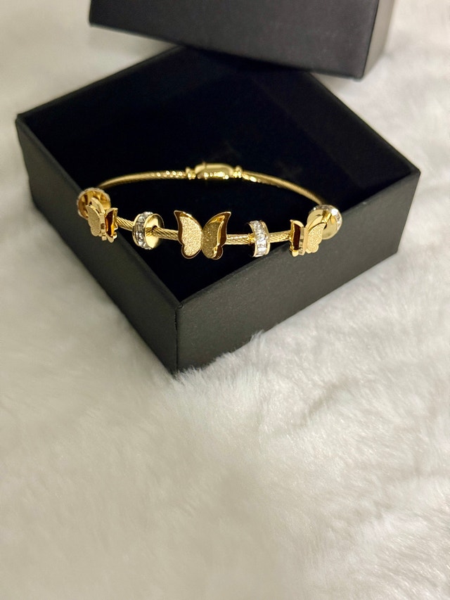 Gold tone butterfly cable bangle bracelet - photo 3