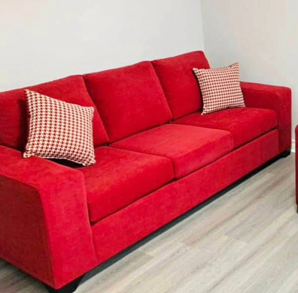 Leon’s red Three-Seater Sofa