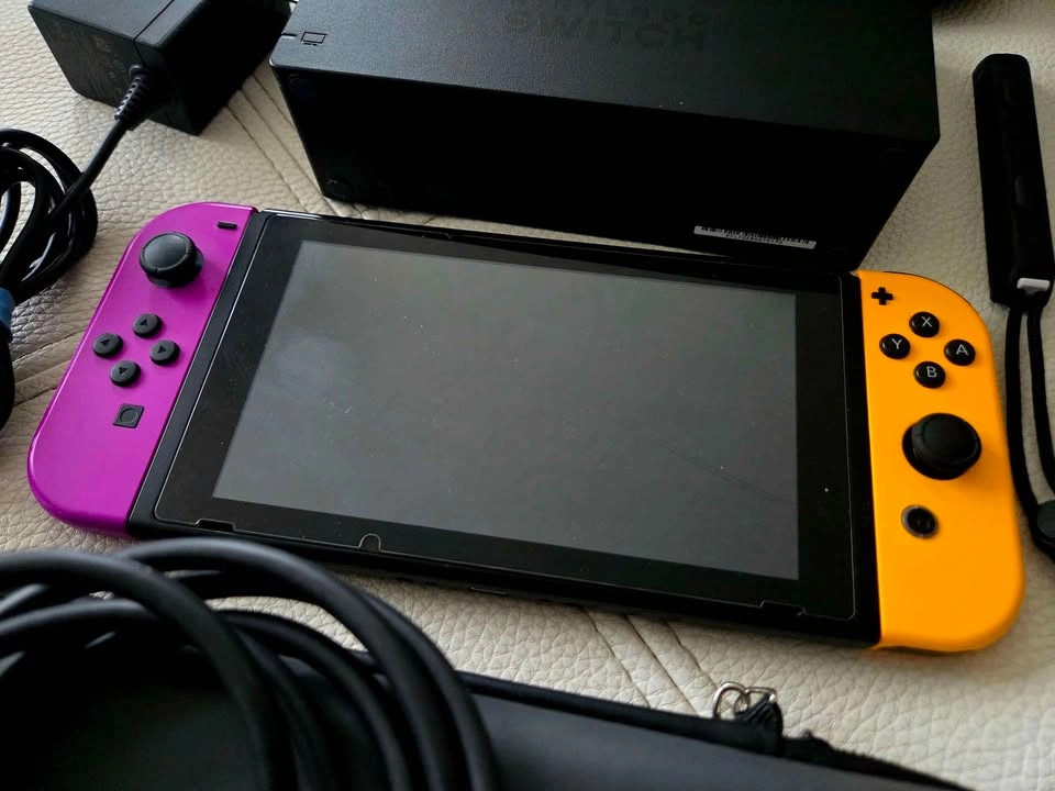 Nintendo Switch Bundle Neon Purple/Orange + Pokémon Violet - photo 2