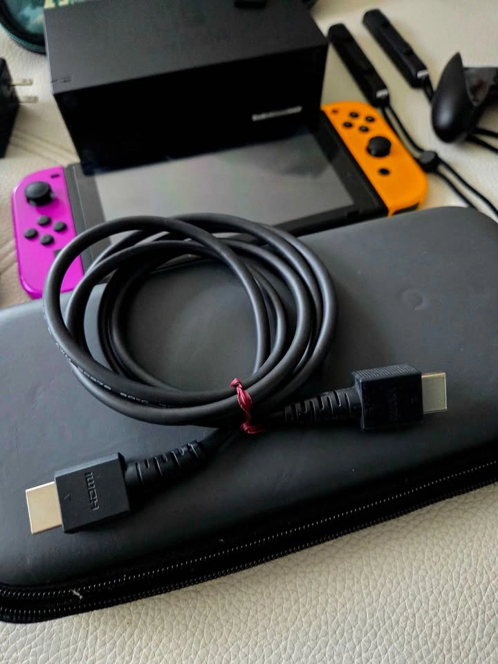 Nintendo Switch Bundle Neon Purple/Orange + Pokémon Violet - photo 3