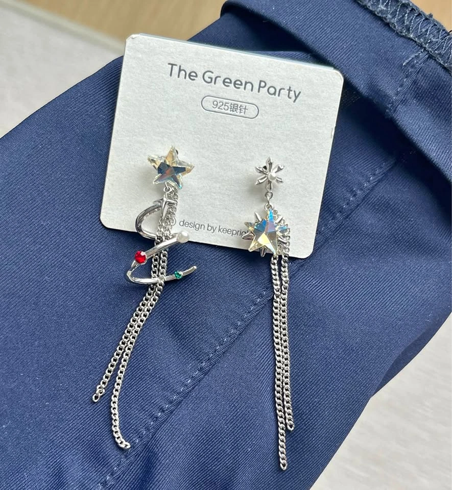 Dangling spiral star earrings