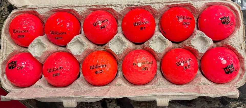 Golf Balls - Pink and Red Wilsons in Edgemont