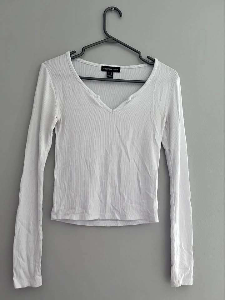 White long sleeve top