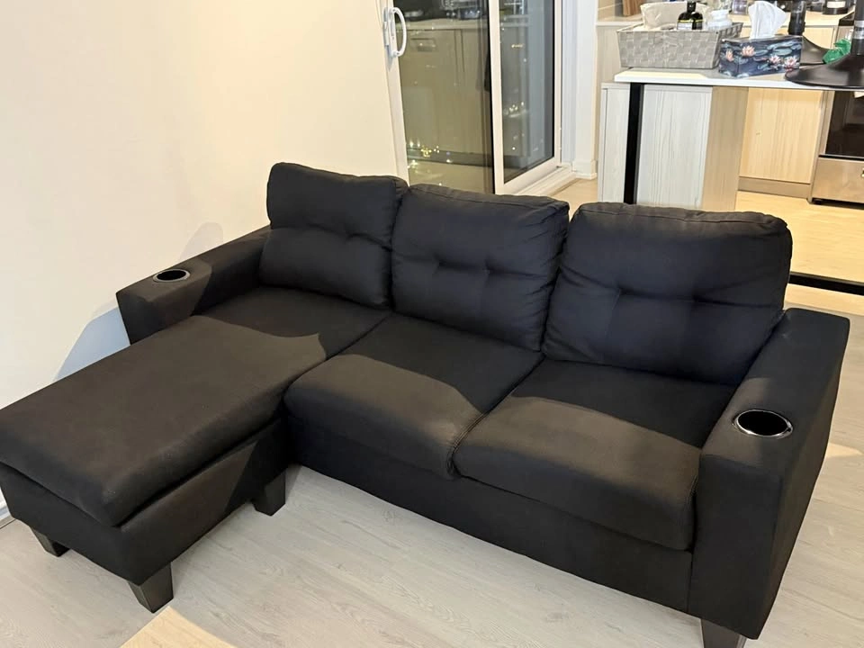 Black Fabric L-Shape Sectional Sofa w/ Cup Holders & Ottoman
