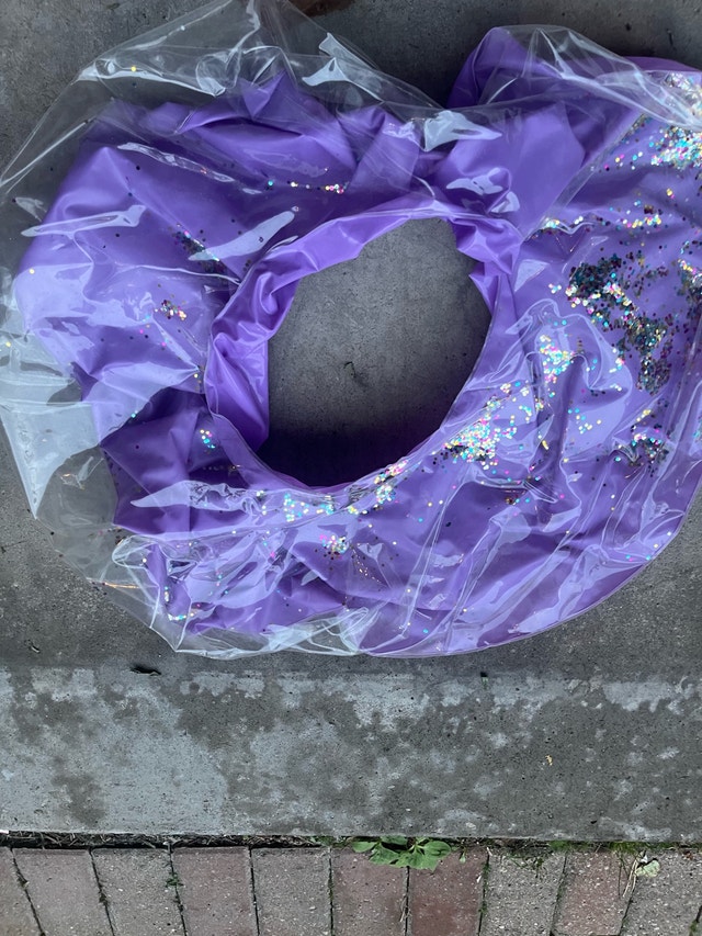 Sparkly purple pool floaty