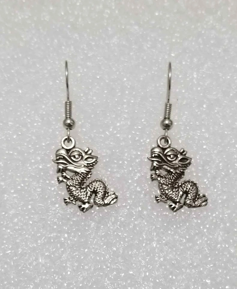 Dragon charm earrings