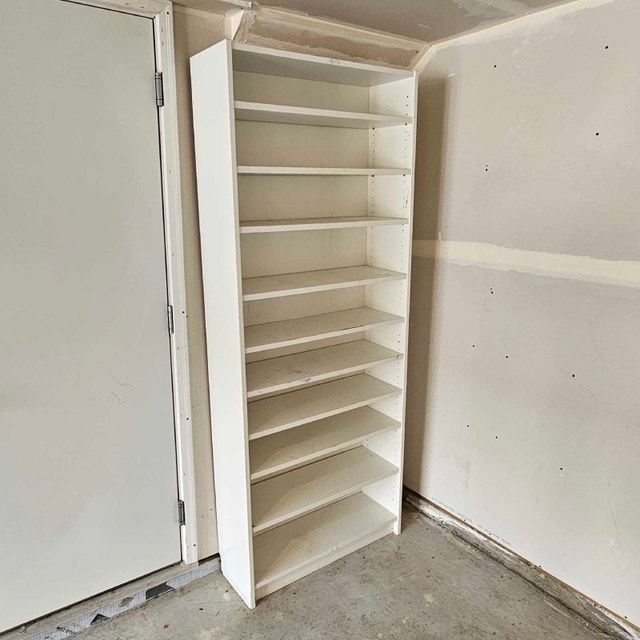 Delivery Available: Tall white Bookshelf
