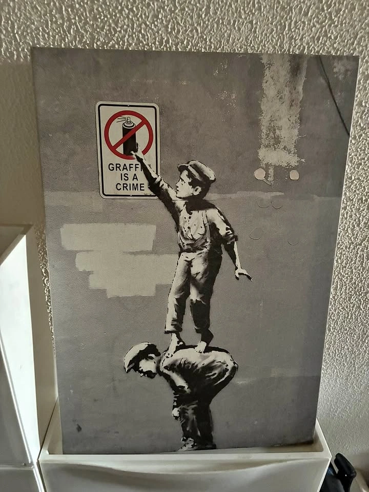 Graffiti is a crime by Banksy